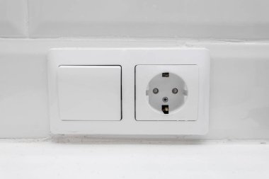 Elektrik soketi Closeup beyaz duvar