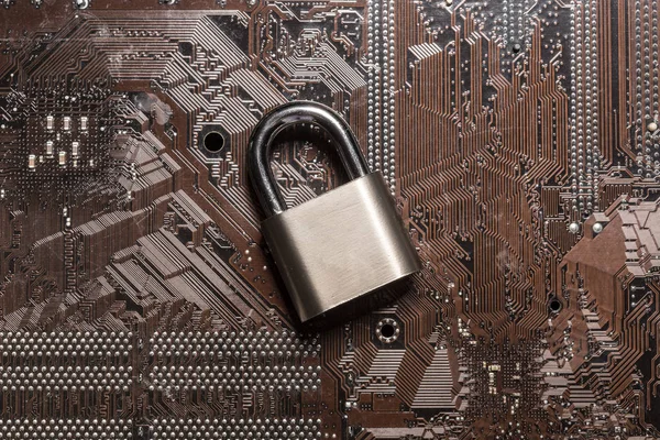 padlock on a computer circuit board