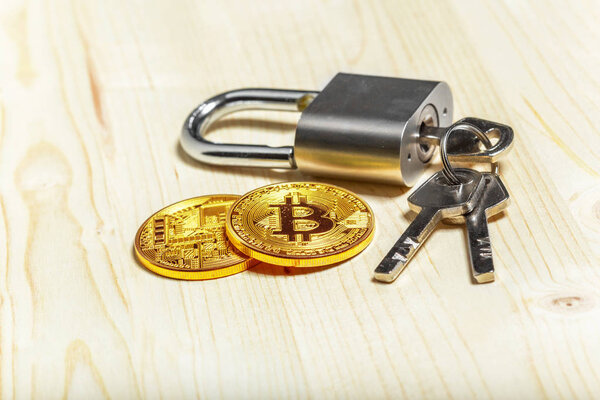 Gold bitcoin and padlock, crypto currency concept
