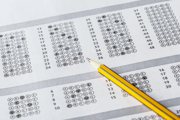 Close view of test score sheet with answers