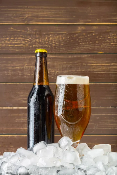 Bottle of cold and fresh beer with ice