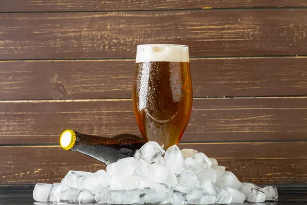 Bottle of cold and fresh beer with ice