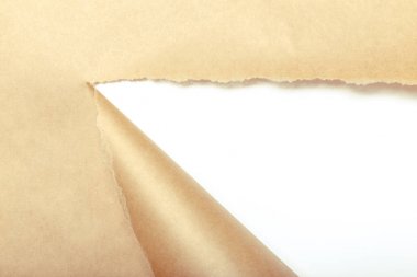 Brown package paper torn to reveal white panel clipart