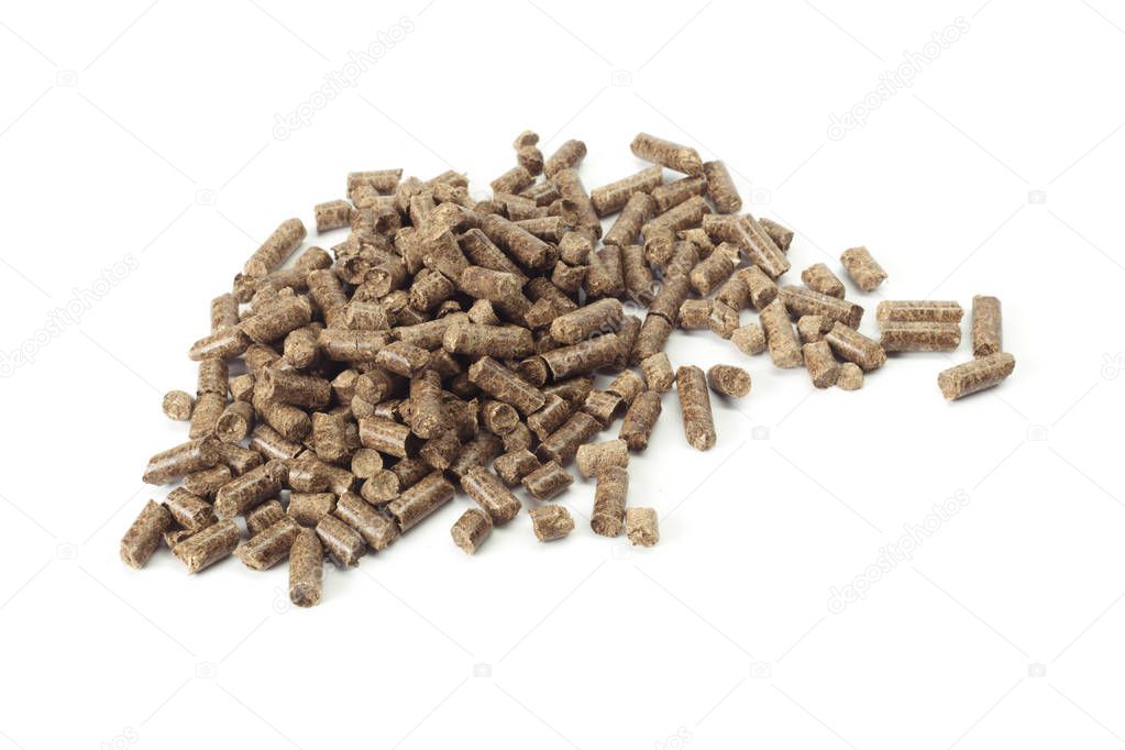 Energy. Pellets on the table on white background.