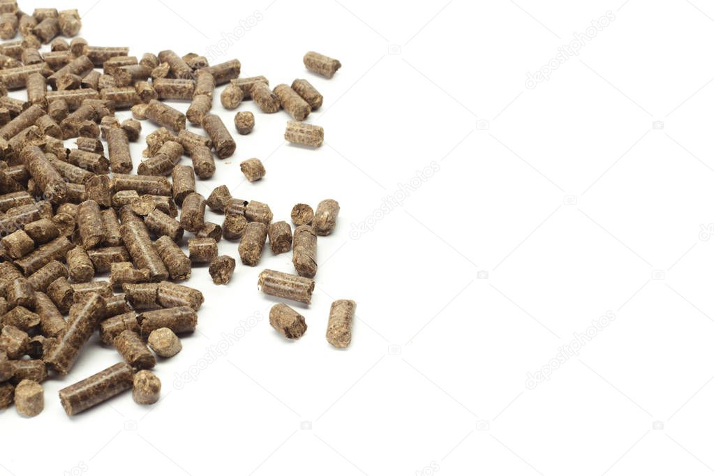 stack of wooden pellets for bio energy, white background, isolated.