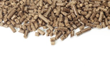 Enerji. Beyaz zemin üzerine masada granül.