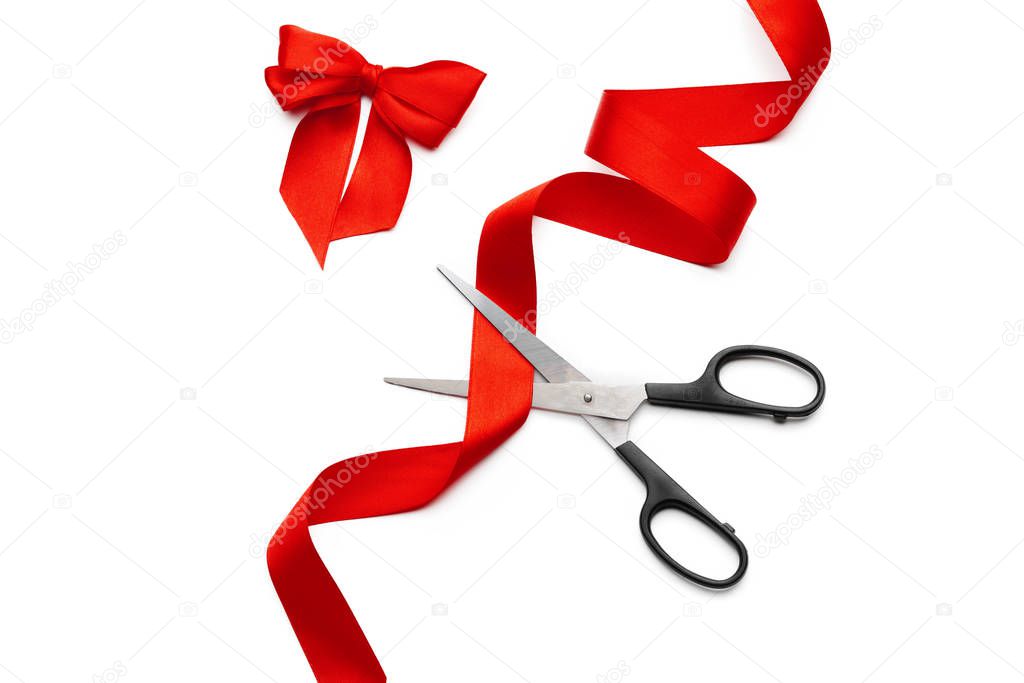 ribbon with scissors isolated on white. creative photo.
