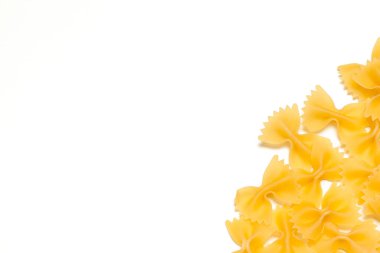 uncooked pasta on white. creative photo. top view