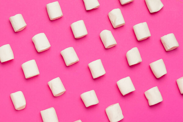 Marshmallows on color background. top view. creative photo.