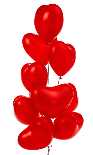 Léggömbök. Egy rakás piros szív alakú fólia lufi. — Stock Fotó