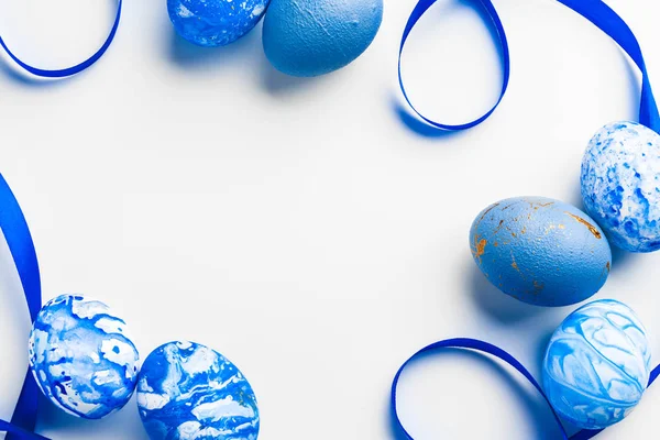 Blue Easter eggs isolated on white. Creative photo. — Stock Photo, Image