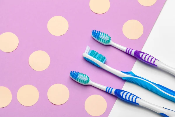 Toothbrushes on pink background. creative photo. top view — Stock Photo, Image