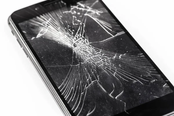 Mobile phone with broken screen . creative photo.