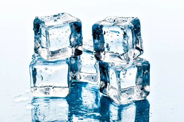 ice cubes on white background. Creative photo.