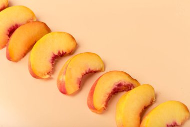 Ripe peach fruit slice. close up. creative photo