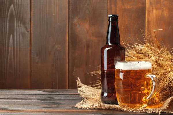 Glass beer on wood background. Creative photo. — Stock Photo, Image