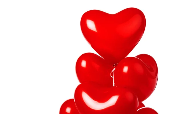 Globos de aire. Ramo de globos de lámina en forma de corazón rojo —  Fotos de Stock