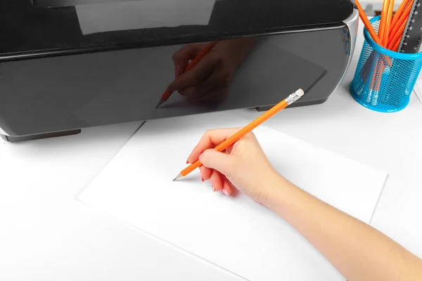 Woman using the printer to scanning and printing document