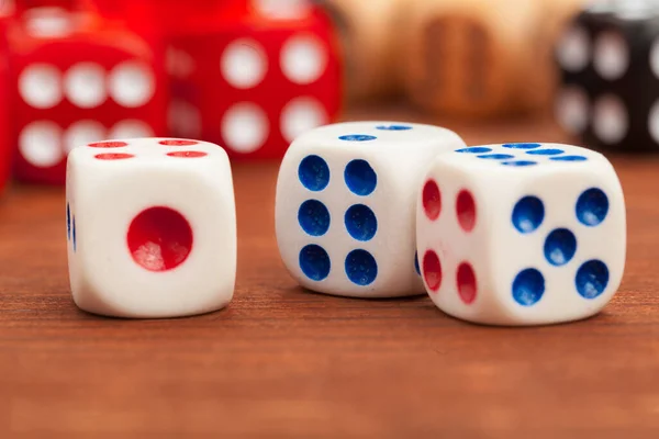 Dice on a wooden table. Concept for business risk. — Stock Photo, Image