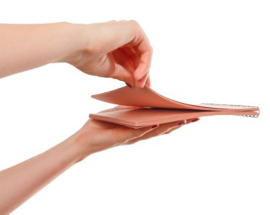 Elindeki defter. Beyaz arka planda izole edilmiş. yaratıcı fotoğraf.