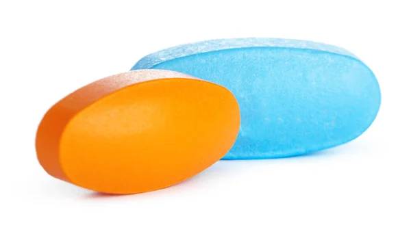 Colorful pills isolated on white. creative photo. — Stock Photo, Image