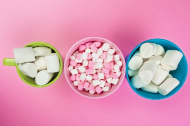 Marshmallows on pink background. close up. creative photo.
