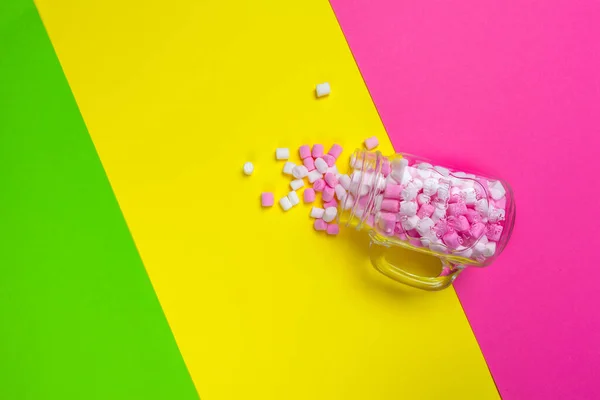 minimal sweet marshmallow on color background. close up. creative photo.