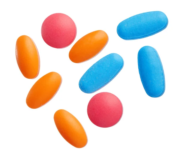 Colorful pills isolated on white. creative photo. — Stock Photo, Image