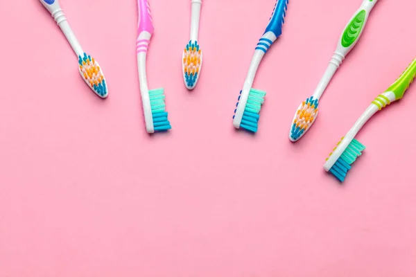 Toothbrushes on pink background. close up. creative photo. — Stock Photo, Image