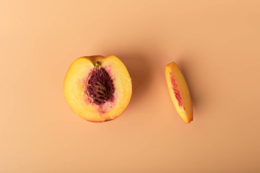 Ripe peach fruit slice. close up. creative photo.