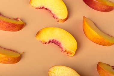 Ripe peach fruit slice. close up. creative photo.