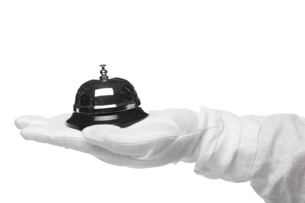 First-class service. Hand in white gloves holding hotel bell — Stock Photo, Image