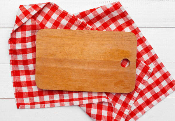 Wooden board stand on tablecloth creative photo.
