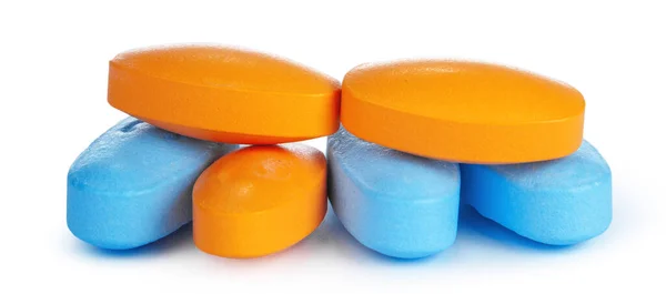 Colorful pills isolated on white creative photo. — Stock Photo, Image