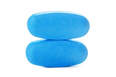 blue drugs isolated on white background. creative photo.