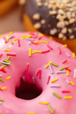 Assorted sweet donuts close up. creative photo.