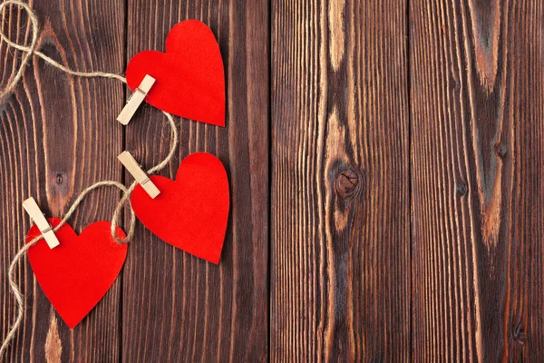 Valentines day red heart on old wood. Holidays background.