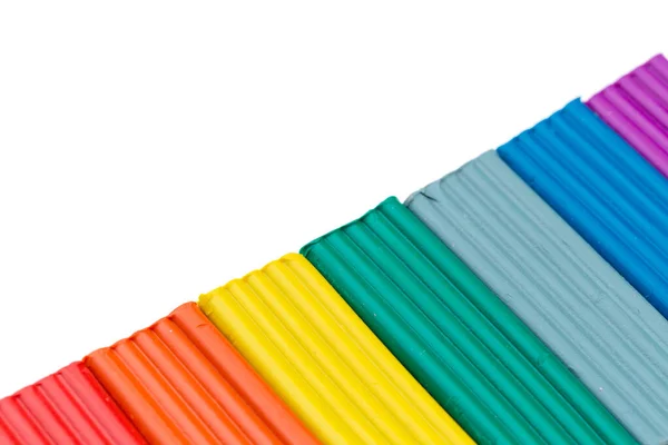 Varas coloridas de plasticina isoladas sobre fundo branco — Fotografia de Stock