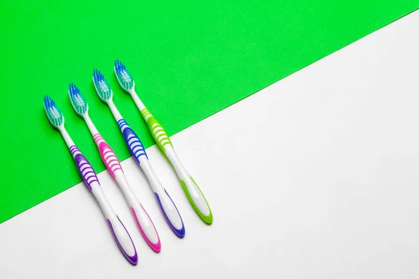 Toothbrush on green background, dental care concept — Stock Photo, Image