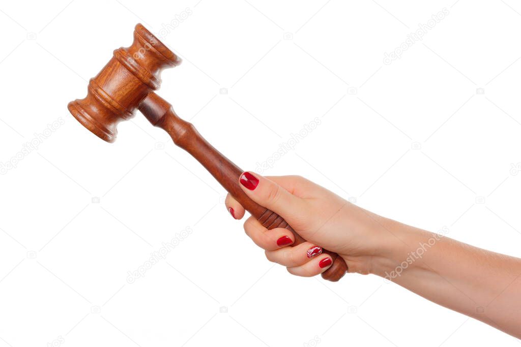 Woman Holding Wooden Gavel in Her Fist Isolated on a White Background