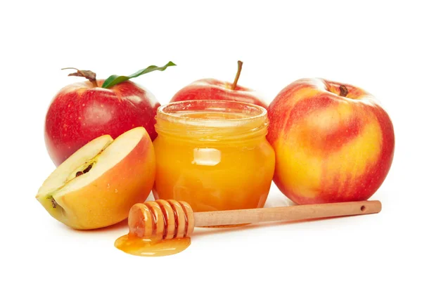 Manzanas y tarro de miel para vacaciones judías de año nuevo aisladas sobre fondo blanco — Foto de Stock