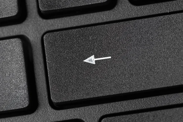 Fekete laptop billentyűzet közeledik. Makrofotó. — Stock Fotó