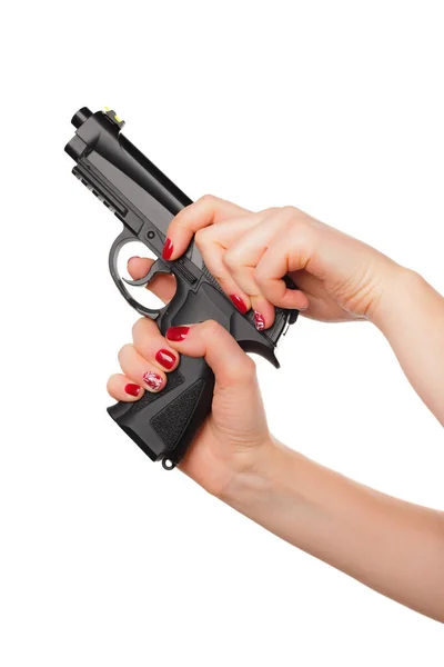 Фото женщины, держащей пистолет-револьвер на белом фоне — стоковое фото