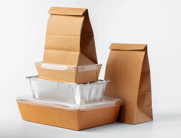 Set of recyclable food packaging on white background — Stock Photo, Image