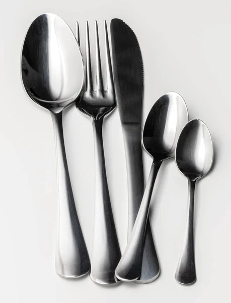 Set of silver cutlery on a white background — Stock Photo, Image