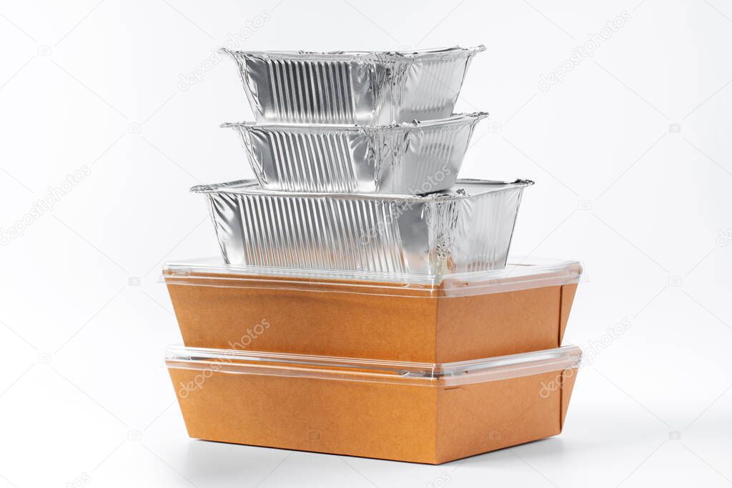 Assortment of food delivery containers on white background