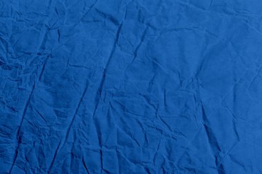 Arkaplan olarak buruşmuş klasik mavi kumaş