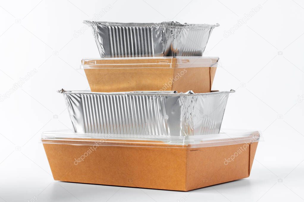 Assortment of food delivery containers on white background