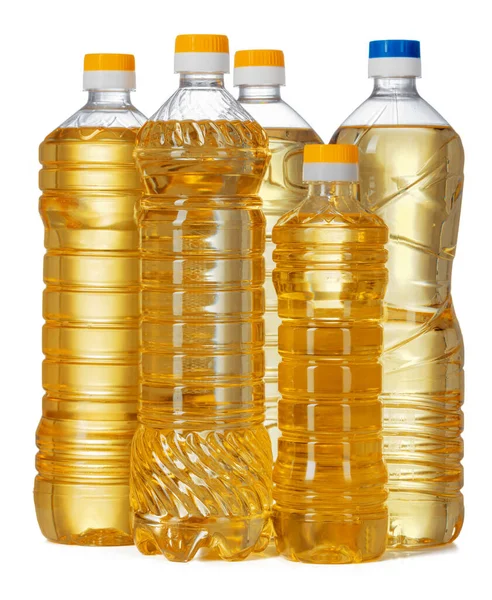 Набір соняшникової олії в пластиковій пляшці ізольовані на білому тлі — стокове фото