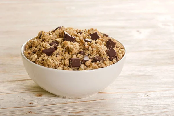 muesli chocolate on a wooden background
